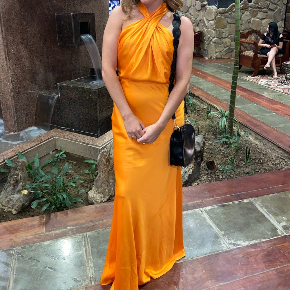 Beautiful vibrant orange ball gown. Wore once to a formal NYE party!